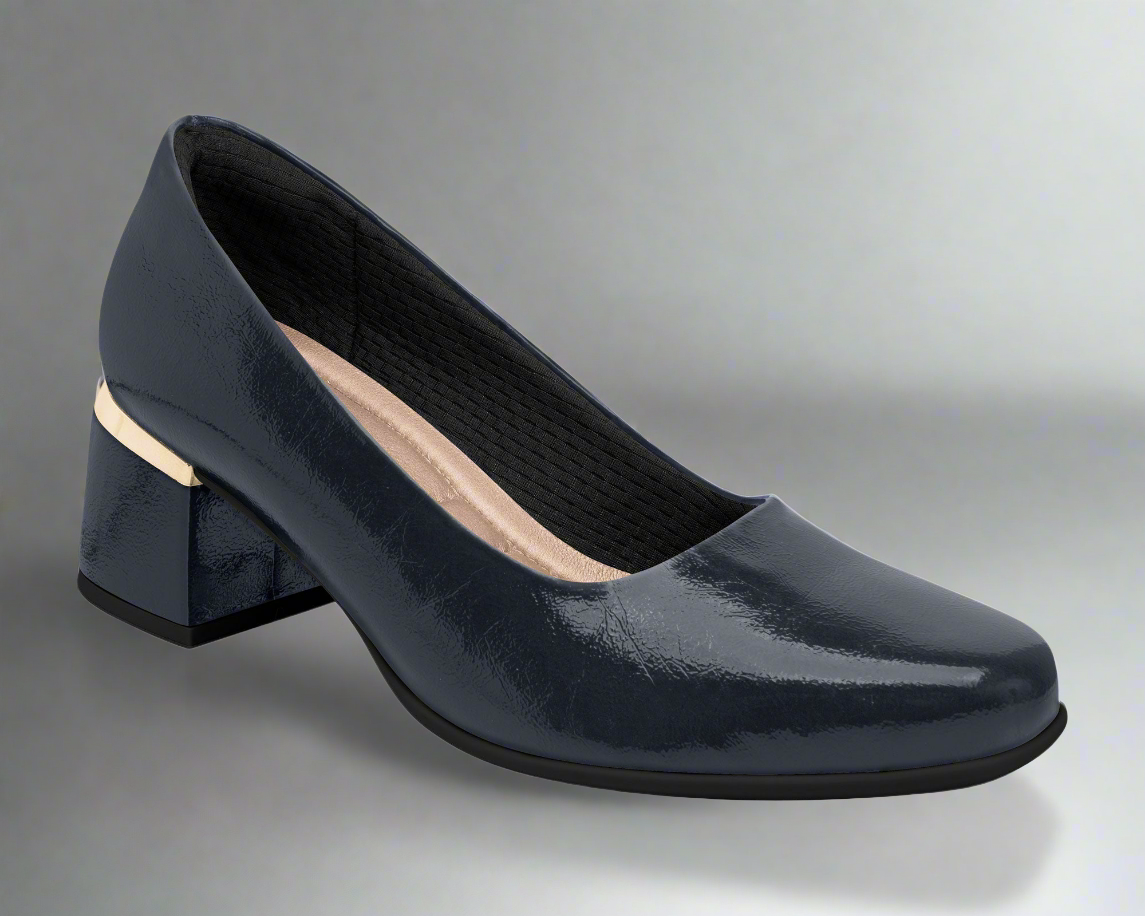 Navy blue shoe with a block heel on a studio background