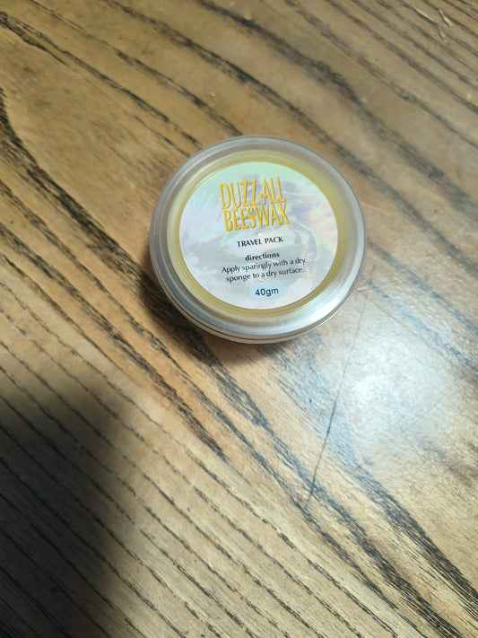 Assorted leather and napa accessories including boots and wallets. All-purpose cleaner for natural and synthetic materials